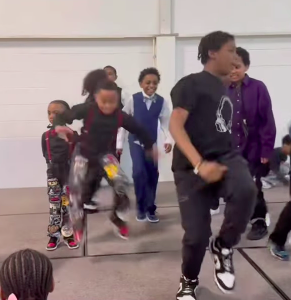 Youth dance team members performing